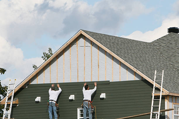 Professional Siding technician working in Wind Ridge, PA